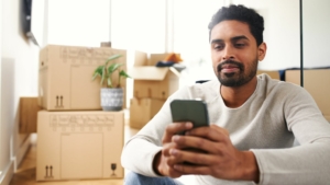 Young man looking at his phone
